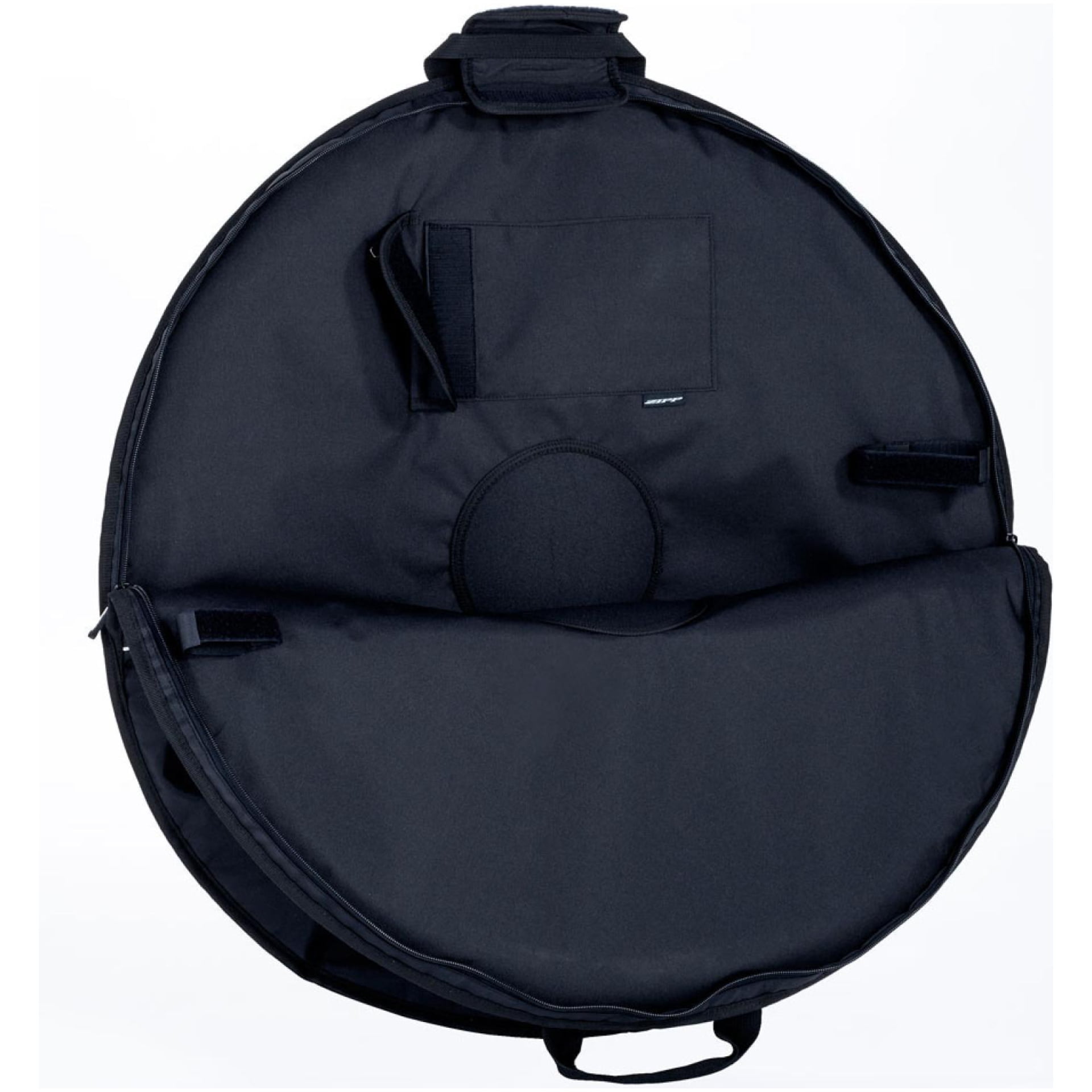 Die Zipp Laufradtasche Single Soft ist eine schwarze, runde Tragetasche mit Griff und Reißverschluss. Sie ist offen abgebildet und zeigt Innentaschen und Riemen, die zum Sichern von Gegenständen dienen. Das strapazierfähige Material macht sie ideal für den Transport empfindlicher Geräte oder Musikinstrumente. Ab sofort im Online-Fahrradshop von Lucas Bike erhältlich.