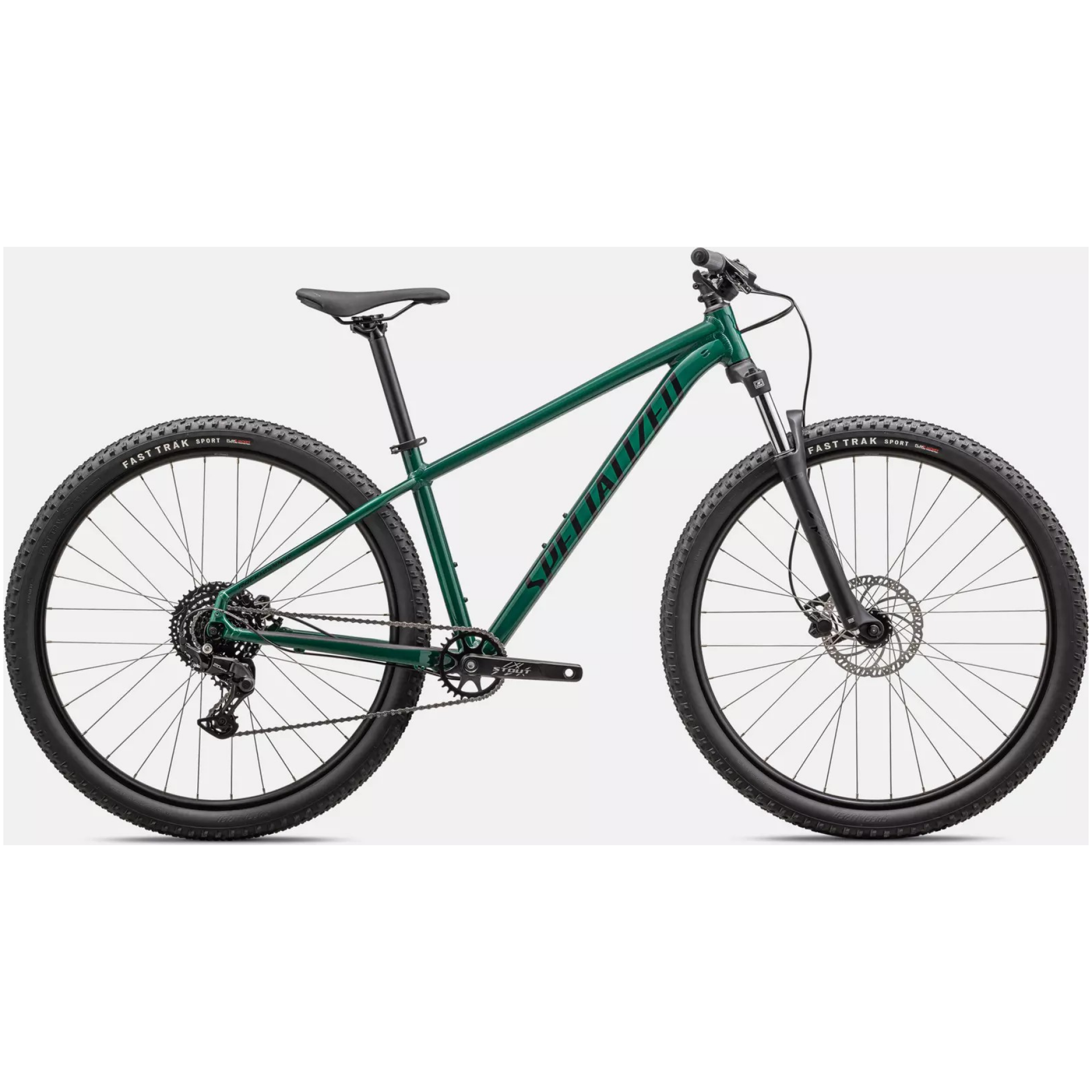 Sehen Sie sich das Specialized Rockhopper Sport 27.5 an, ein grünes Mountainbike mit schwarzen Lenkergriffen und Sattel. Dieses Modell ist mit Scheibenbremsen, dicken Reifen mit der Marke „Fast Trak“ und einem kettengetriebenen Einzelkettenblatt ausgestattet. Der geometrisch gestaltete Rahmen zeigt stolz das „Specialized“-Logo. Weitere Informationen zu diesem fantastischen Fahrrad finden Sie in unserem Online-Fahrradshop.